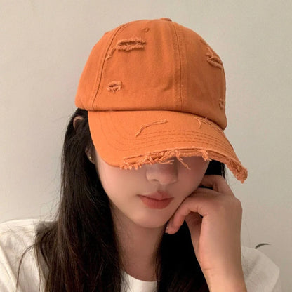 Men's and women's new spring and summer hip-hop versatile soft top curved eave retro personality distressed hole duckbill hat