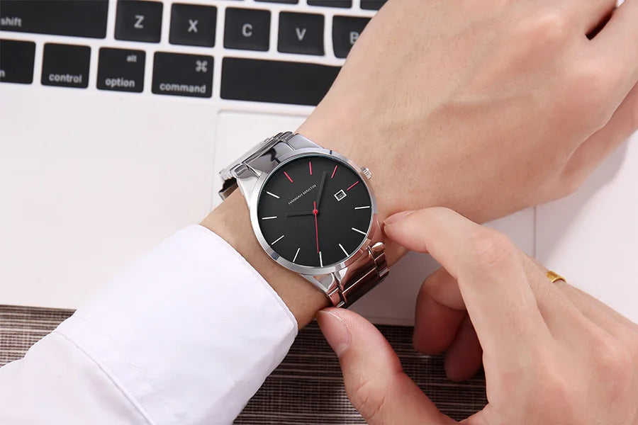 Montre pour homme Hannah Martin, boîtier en acier inoxydable, mouvement à quartz, cadran de 41 mm, style professionnel, avec affichage du calendrier (imitation)