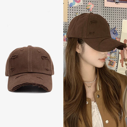 Men's and women's new spring and summer hip-hop versatile soft top curved eave retro personality distressed hole duckbill hat