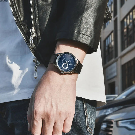 Montre à quartz décontractée pour homme PAGANI DESIGN – Style « luxe accessible », polyvalente, dotée d'un verre traité, étanche, avec boîtier en acier inoxydable et affichage de la date.